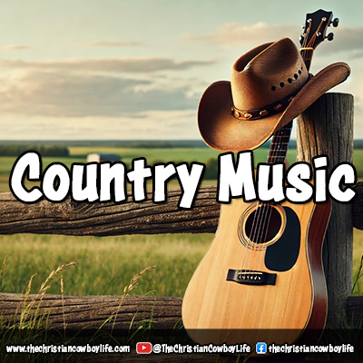 A cowboy hat and an acoustic guitar resting on a rustic wooden fence post in an open countryside landscape.